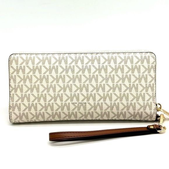 Michael Kors Large Travel Continental Wallet Wristlet
Vanilla/Brown - Picture 5 of 9